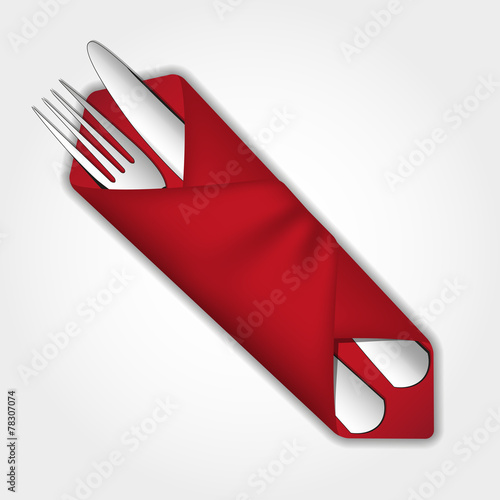 Fork and knife in red cloth
