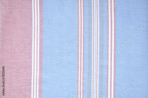 Closeup detail of blue, red and white striped fabric