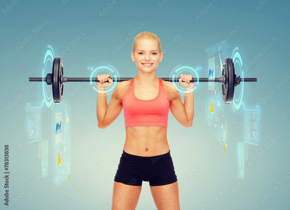 Obraz premium smiling sporty woman exercising with barbell