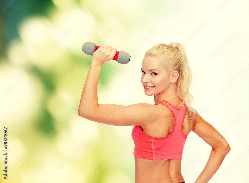 young sporty woman with light dumbbell young sporty woman with light dumbbell