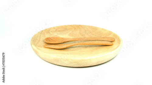 Wooden dish, spoon and fork. Isolated on white background