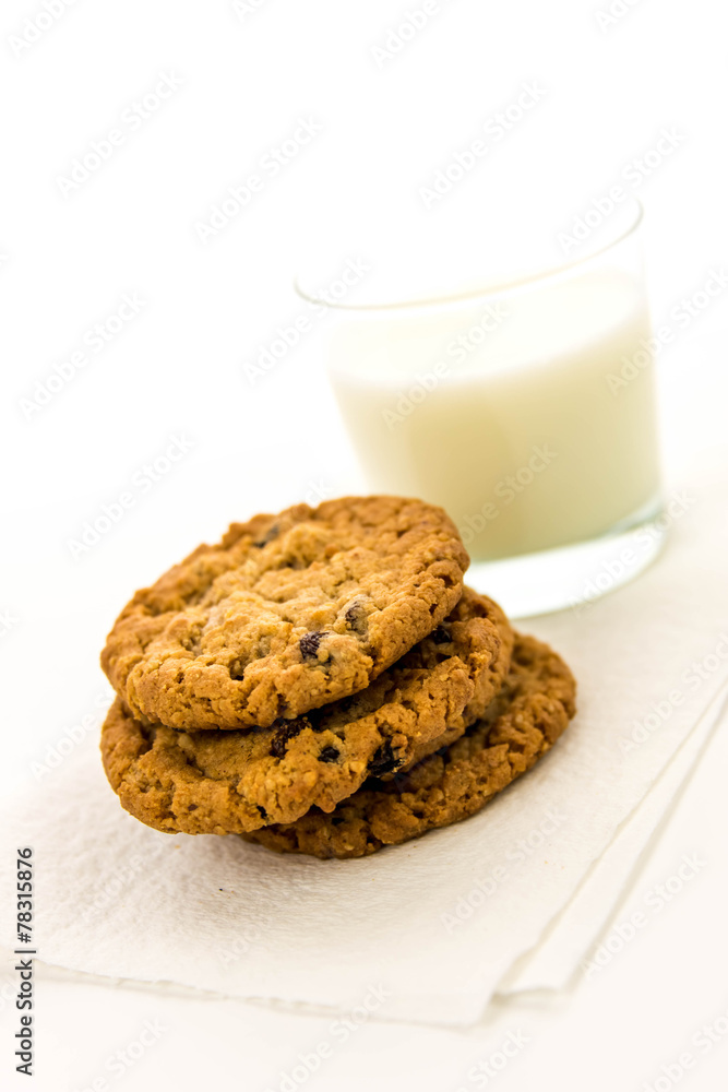 oatmeal raisin cookies and glass of milk oatmeal raisin cookies and glass of milk