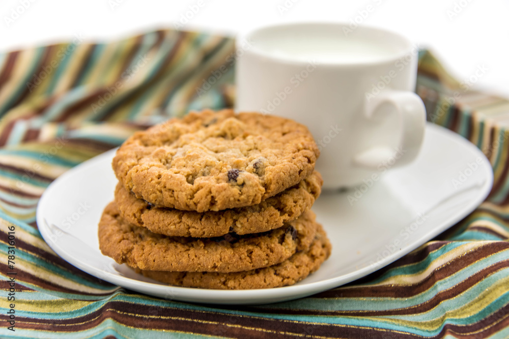 oatmeal raisin cookies and cup of milk oatmeal raisin cookies and cup of milk