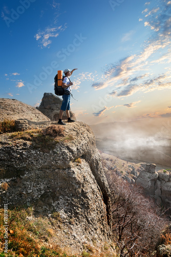 Tourist on rock