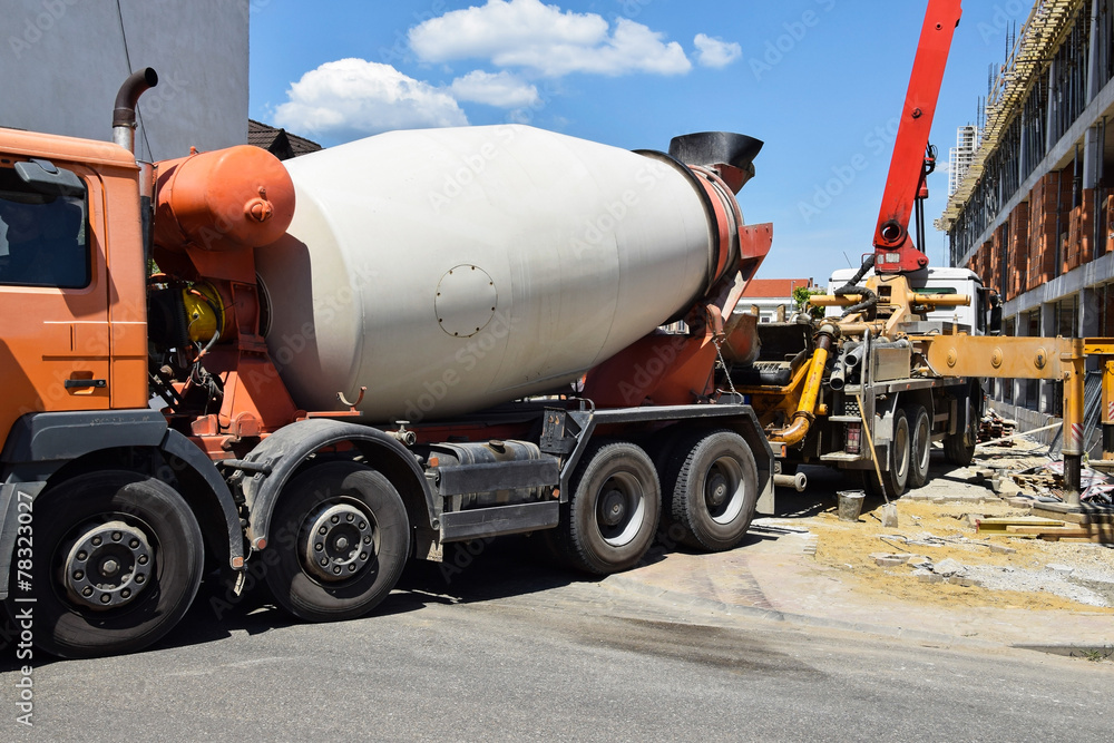 Cement mixer truck at the construction site