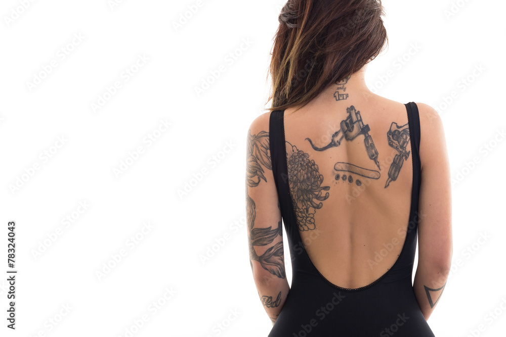 Woman portrait with tattoo against white background. Woman portrait with tattoo against white background.