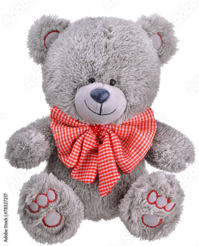 Grey furry teddy bear with red bow
