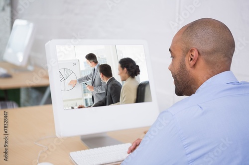 Composite image of business people in office at presentation