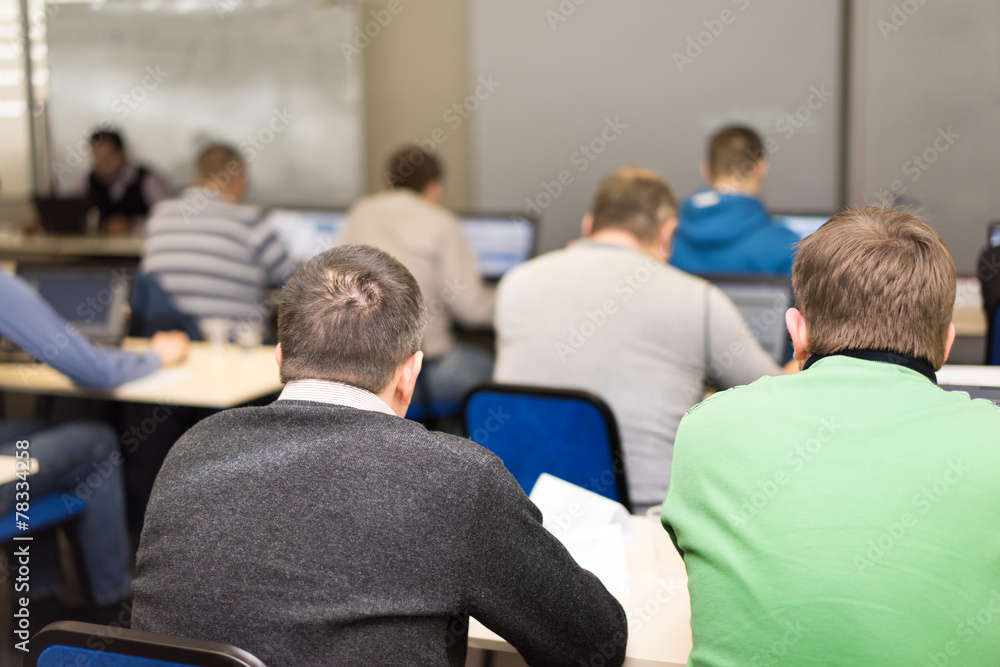 people sitting rear at the computer training class people sitting rear at the computer training class