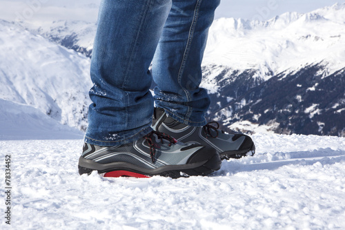 Safety shoes in the snowy mountains