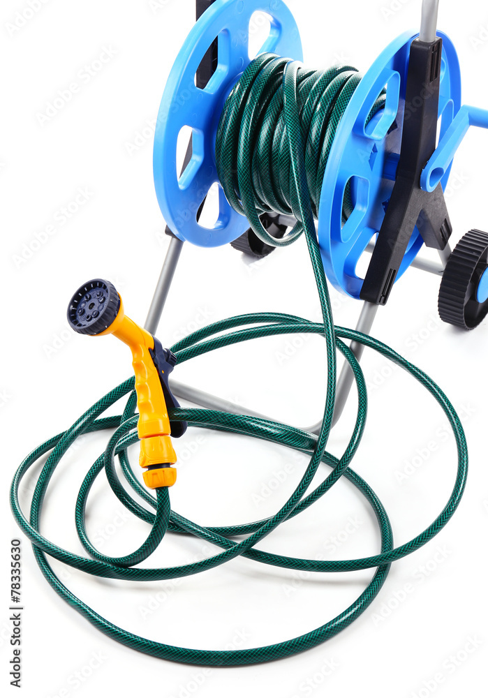 Garden hose on wheels isolated on white Garden hose on wheels isolated on white