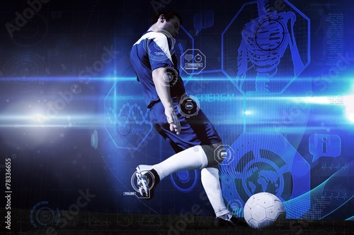Composite image of football player kicking ball © WavebreakmediaMicro