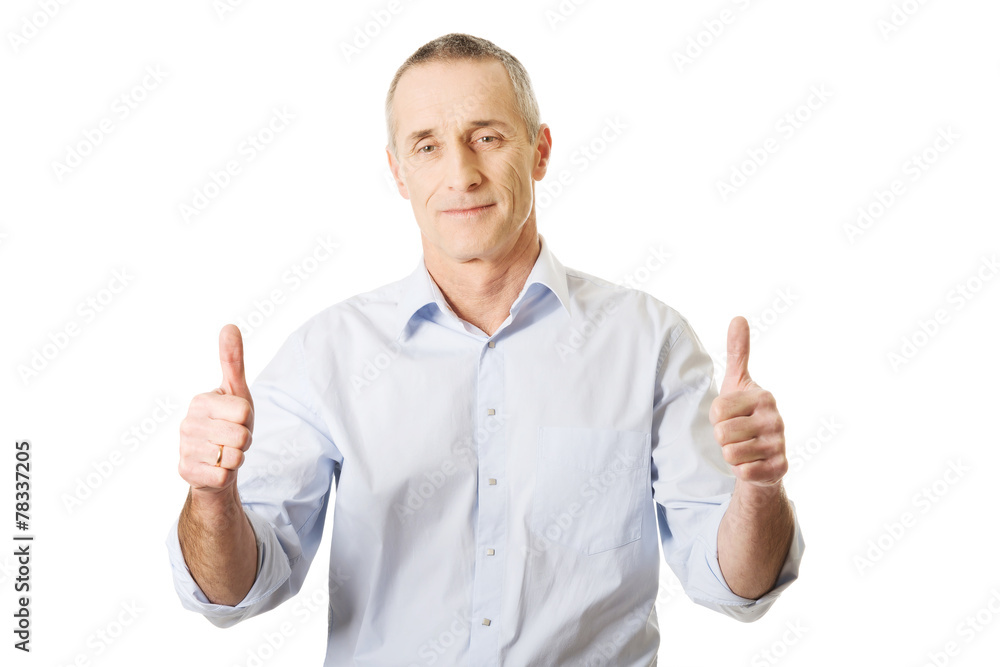 Mature man gesturing ok sign Mature man gesturing ok sign