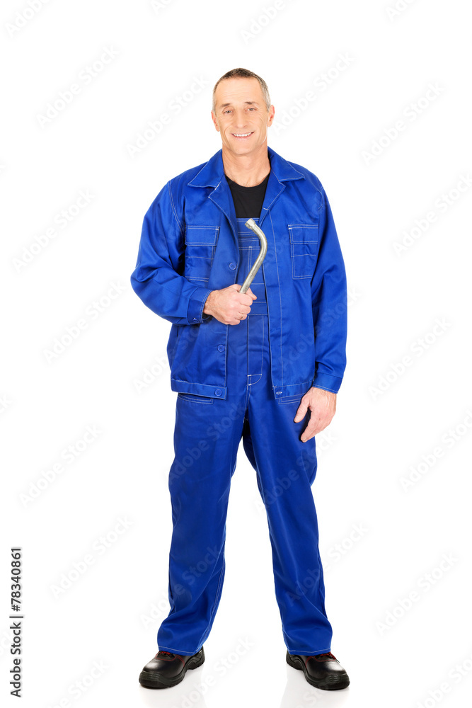 Repairman holding his wrench Repairman holding his wrench
