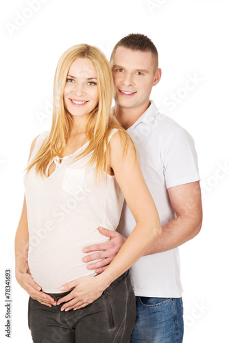 Beautiful young couple expecting baby