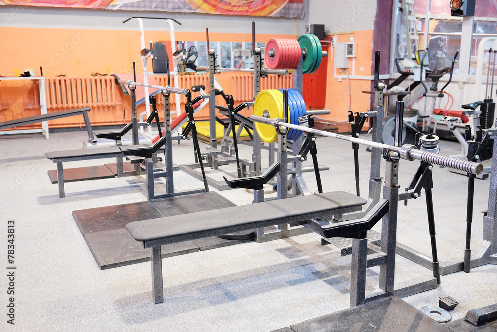 Obraz premium Weight lifting equipments in a club gym