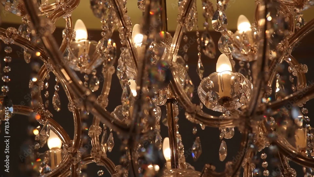 Luxury crystals of a classic chandelier close up Luxury crystals of a classic chandelier close up