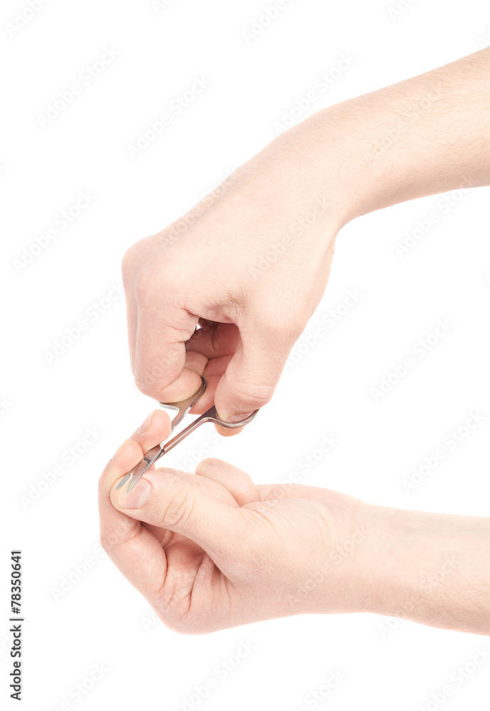 Two male hands cutting nails