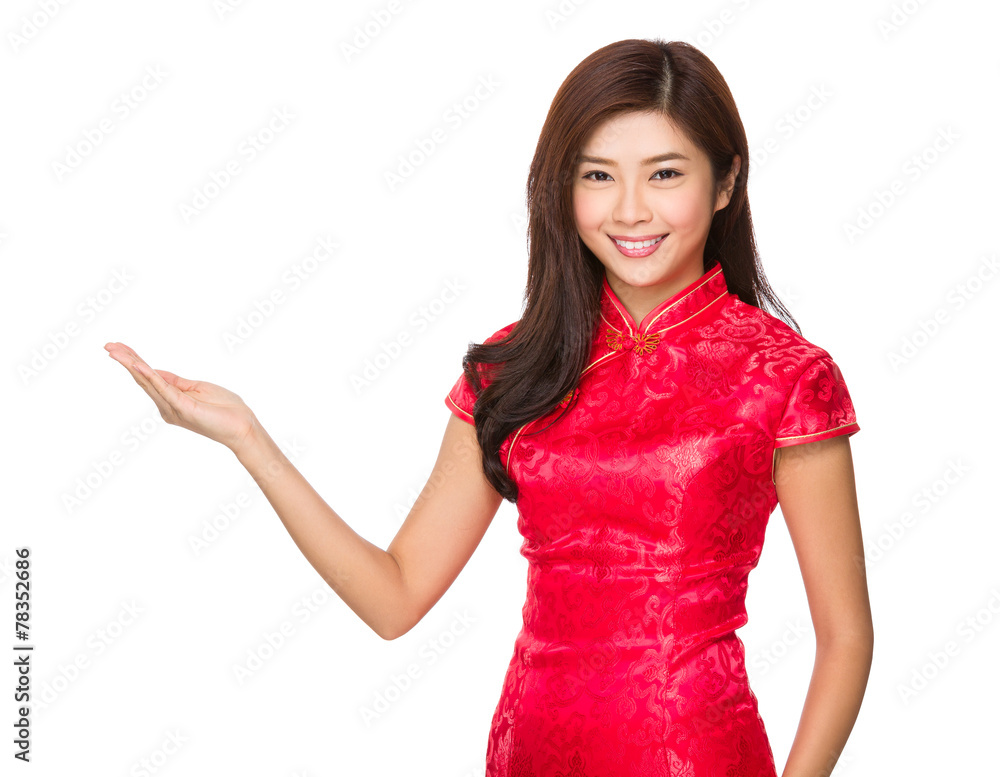 Chinese woman with cheongsam and open hand palm Chinese woman with cheongsam and open hand palm