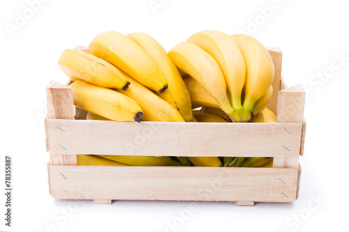 Bananas in wooden crate