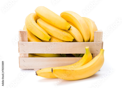 Bananas in wooden crate
