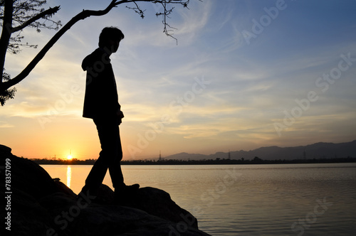 Silhouette of a man on sunset