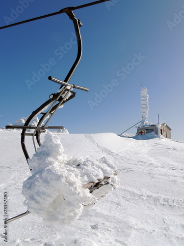 Chairlift And Mountain Rescue Service In Snow photo