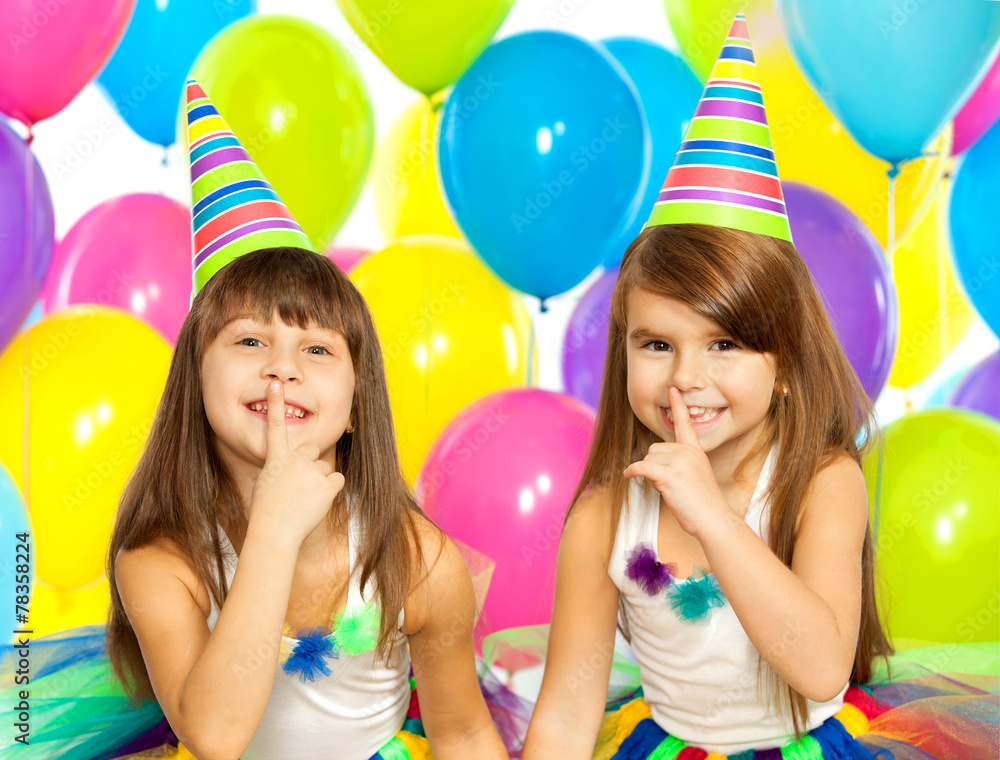 Two little girls at birthday party - obrazy, fototapety, plakaty 