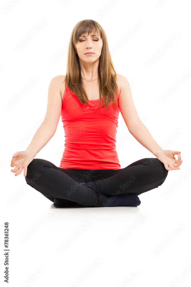 Young caucasian woman relaxing in yoga pose