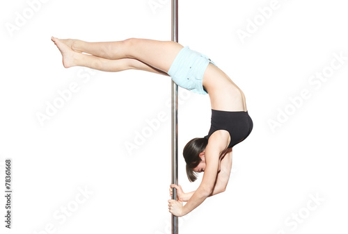 Young woman exercise pole dance, isolated on white