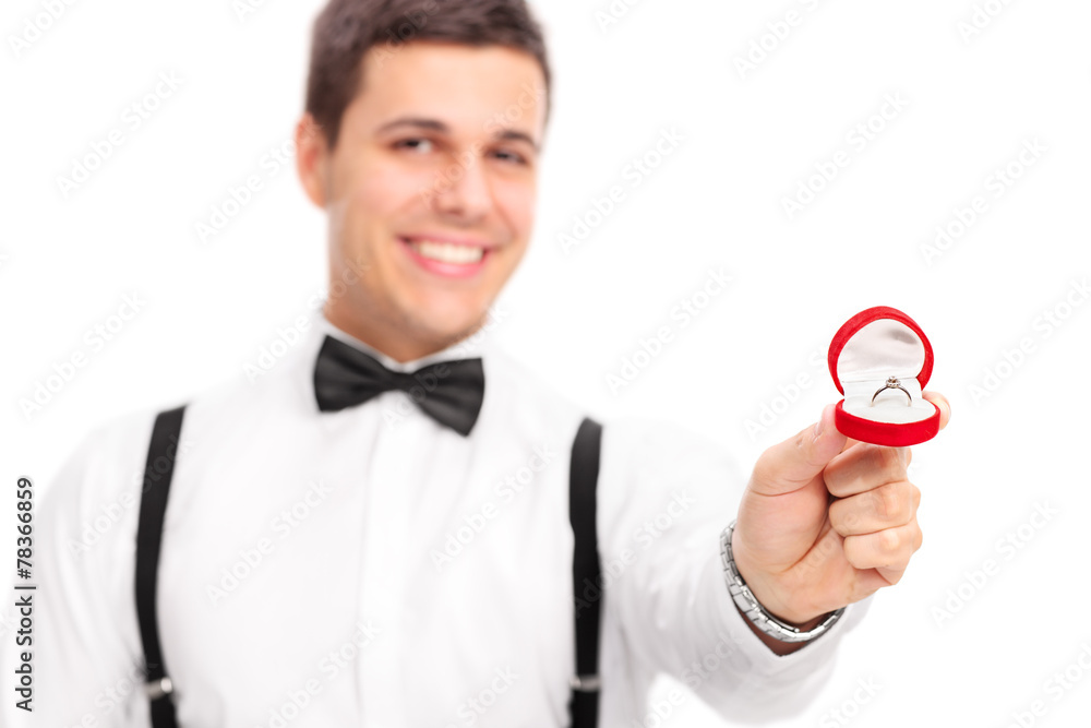 Young man proposing with a diamond ring Young man proposing with a diamond ring