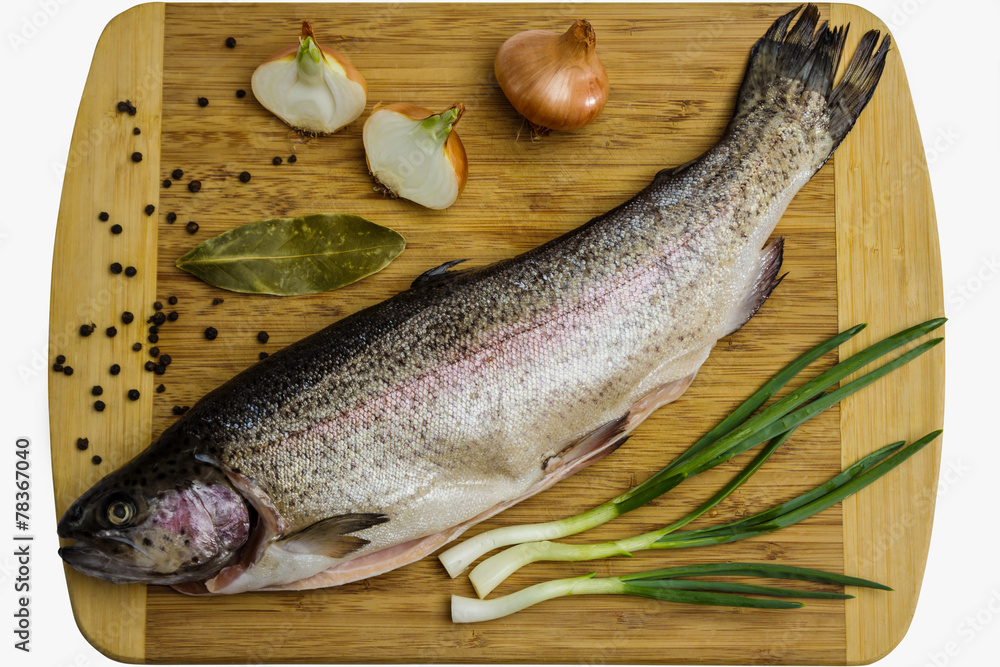 Fresh Salmon trout with bay leaf, black pepper and onion Fresh Salmon trout with bay leaf, black pepper and onion