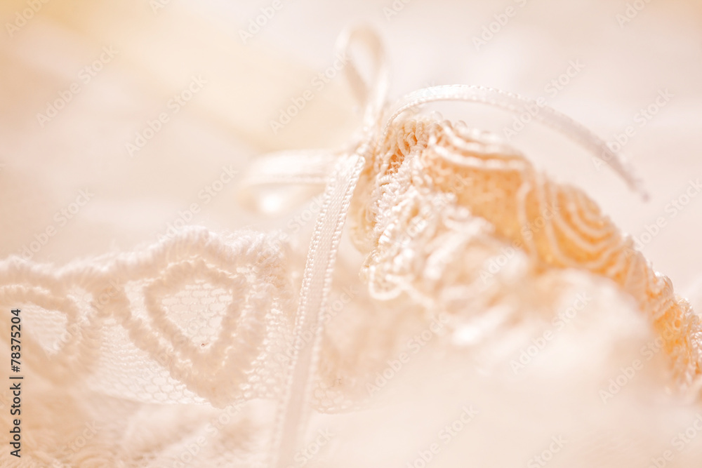 Tenderness peachys lingerie with candle and motif. Love mood.
