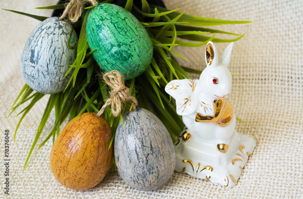 Hand painted Easter eggs and white porcelain rabbit Hand painted Easter eggs and white porcelain rabbit