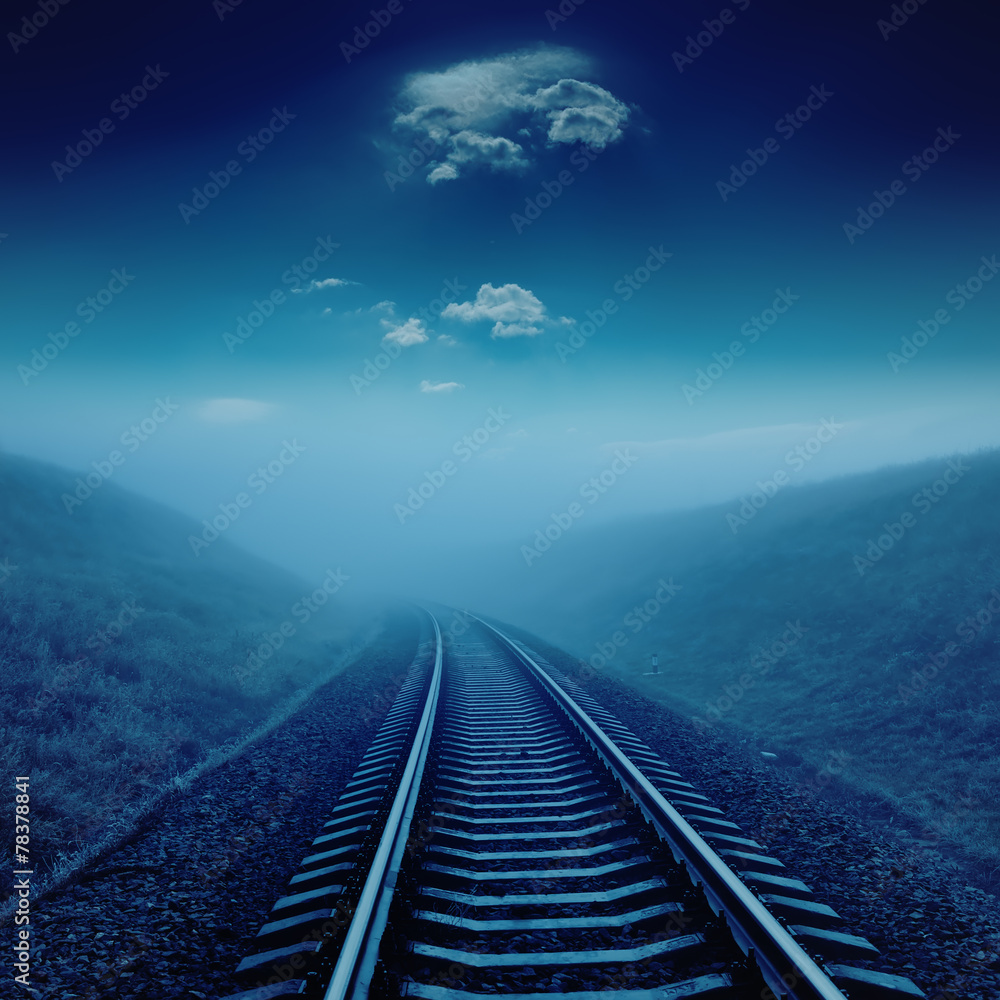 railroad in night under blue moonlight. railroad in night under blue moonlight.