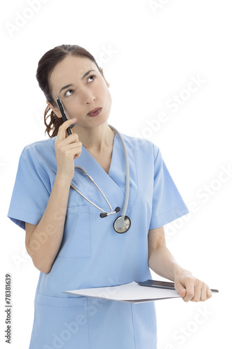 Female doctor or nurse thinking about a solution