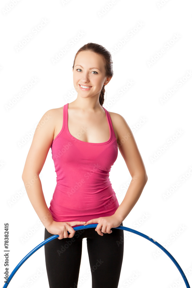 Young woman standing with hula hoop down. Half- length view Young woman standing with hula hoop down. Half- length view