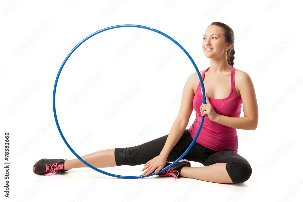 isolated portrait of young blonde woman gymnast with hula hoop isolated portrait of young blonde woman gymnast with hula hoop
