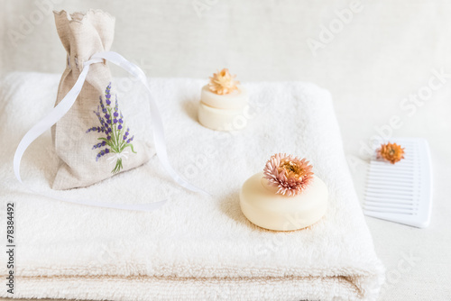 Soap and salt with bath towel