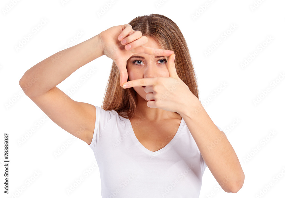 Young woman is showing frame by hands Young woman is showing frame by hands