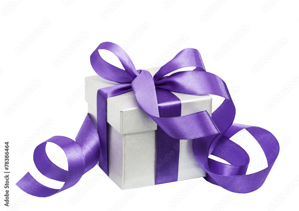 Gift box with a lilac bow isolated on the white Gift box with a lilac bow isolated on the white