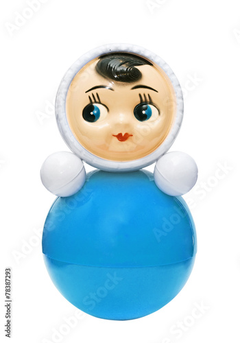 Bright blue roly-poly toy on the white photo