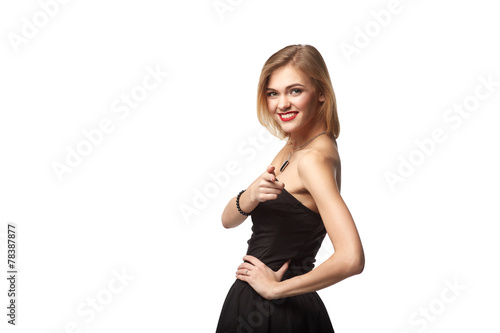 Portrait of smiling business woman standing with folded hands ov