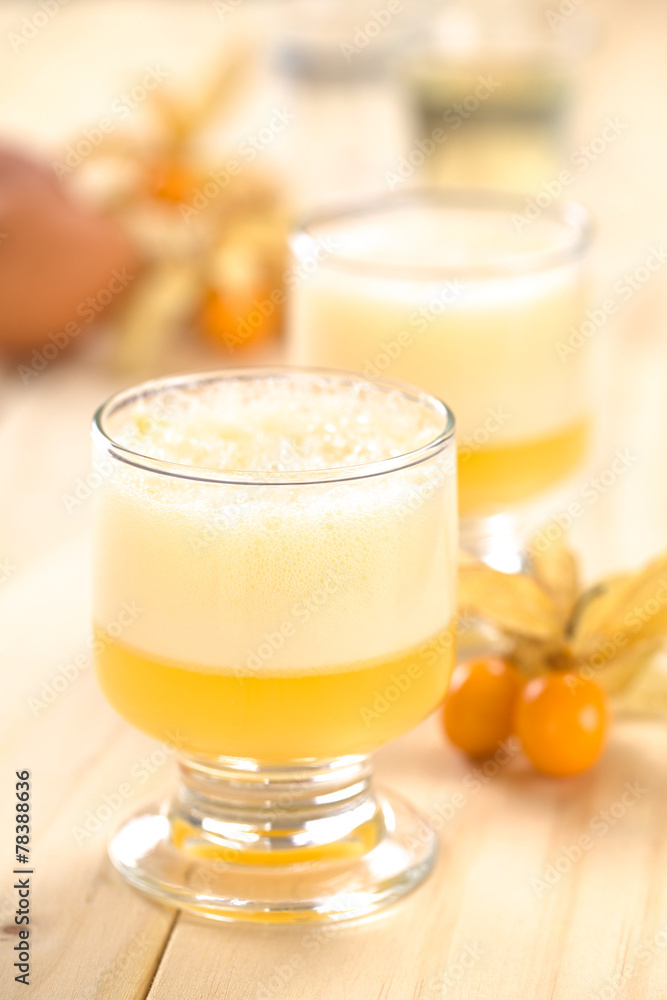 Peruvian cocktail called Aguaymanto Sour (Physalis Sour) Peruvian cocktail called Aguaymanto Sour (Physalis Sour)