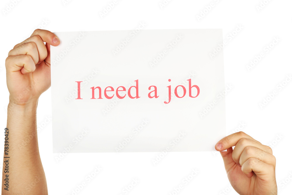 Sheet of paper with inscription I need a job in male hands Sheet of paper with inscription I need a job in male hands