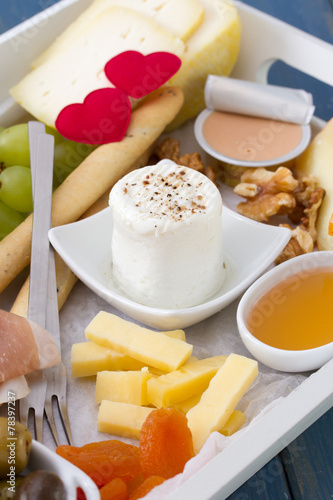 cheese with fruits, honey and pate photo