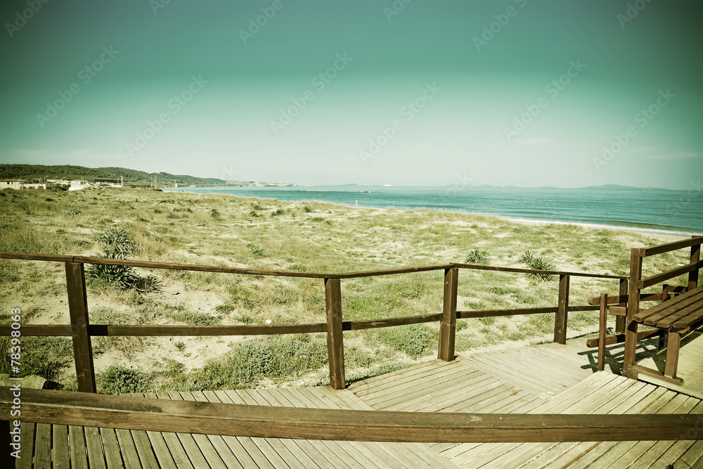 boardwalk by the sea in vintage tone