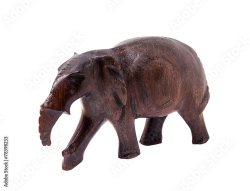 Elephant carved out of wood. African handmade souvenirs © DmyTo