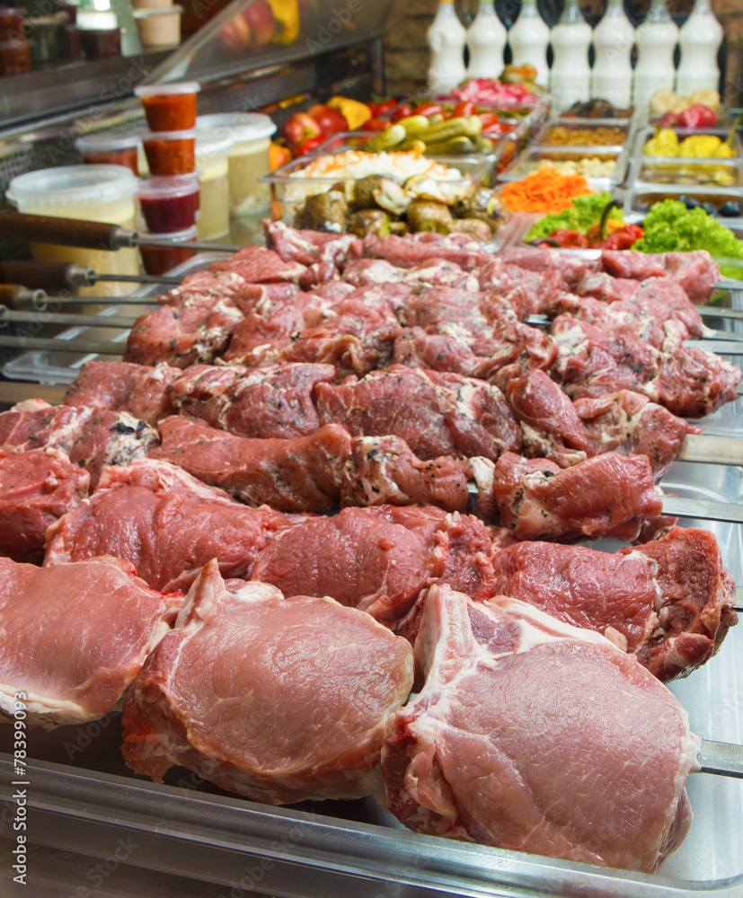 Fresh raw meat for barbecue in a store Fresh raw meat for barbecue in a store