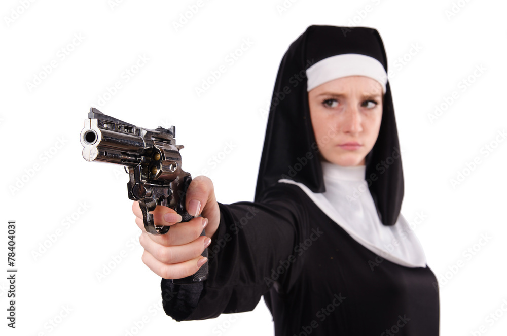 Aiming young nun with gun isolated on white Aiming young nun with gun isolated on white